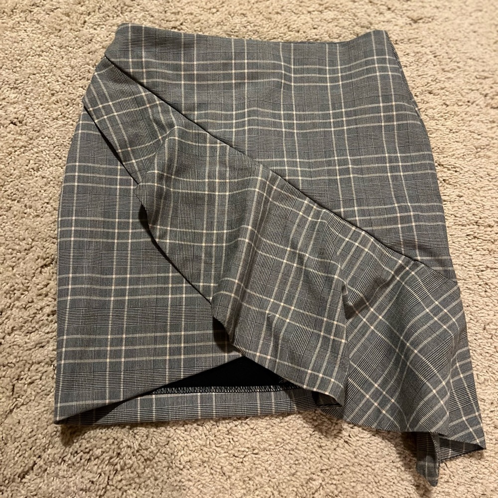 Asymmetrical pleated skirt